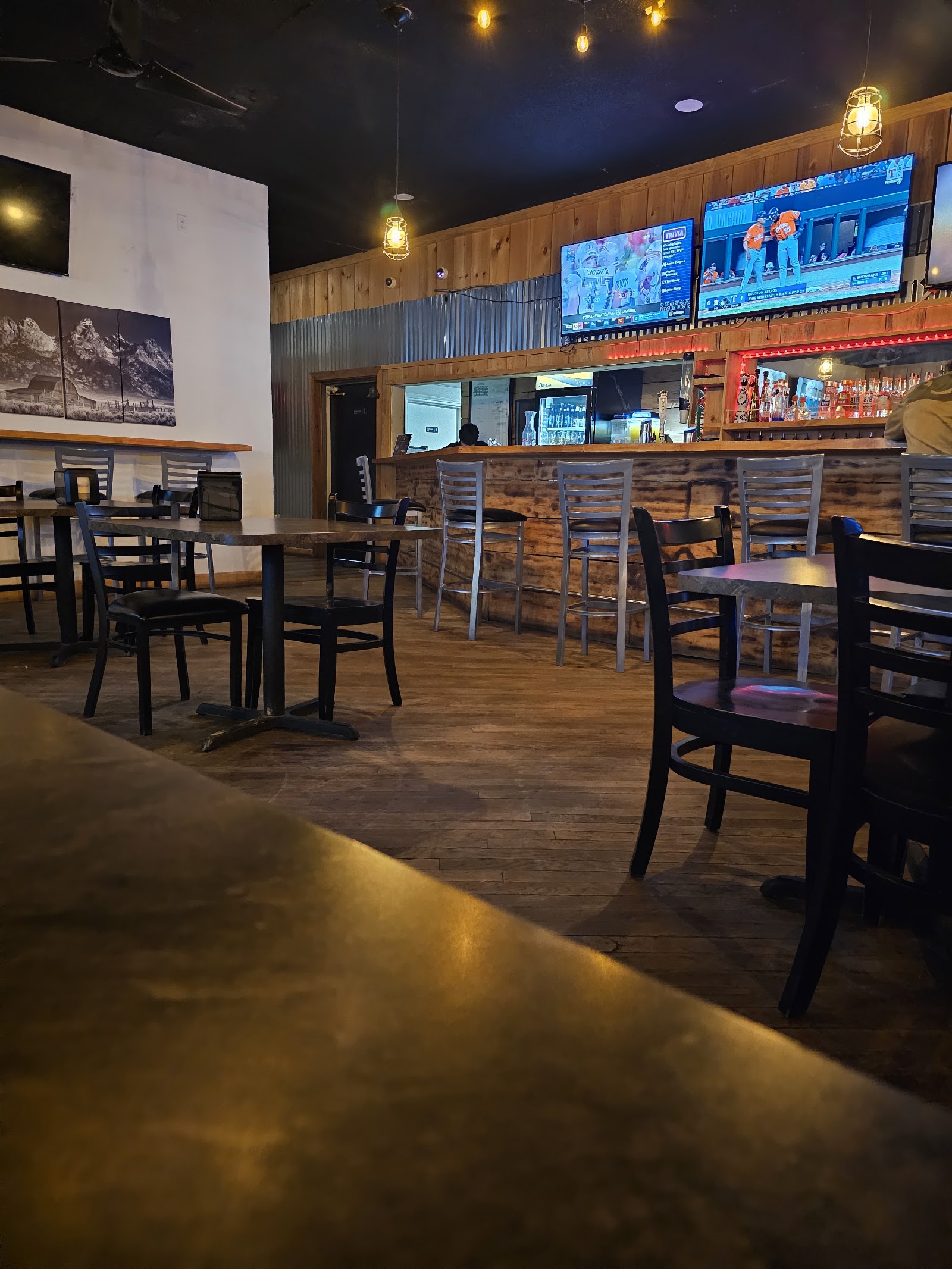 Old 181 Bar and Grill bar seating with TVs